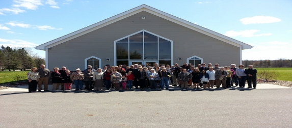 Members of the congregation gathered outside the church building